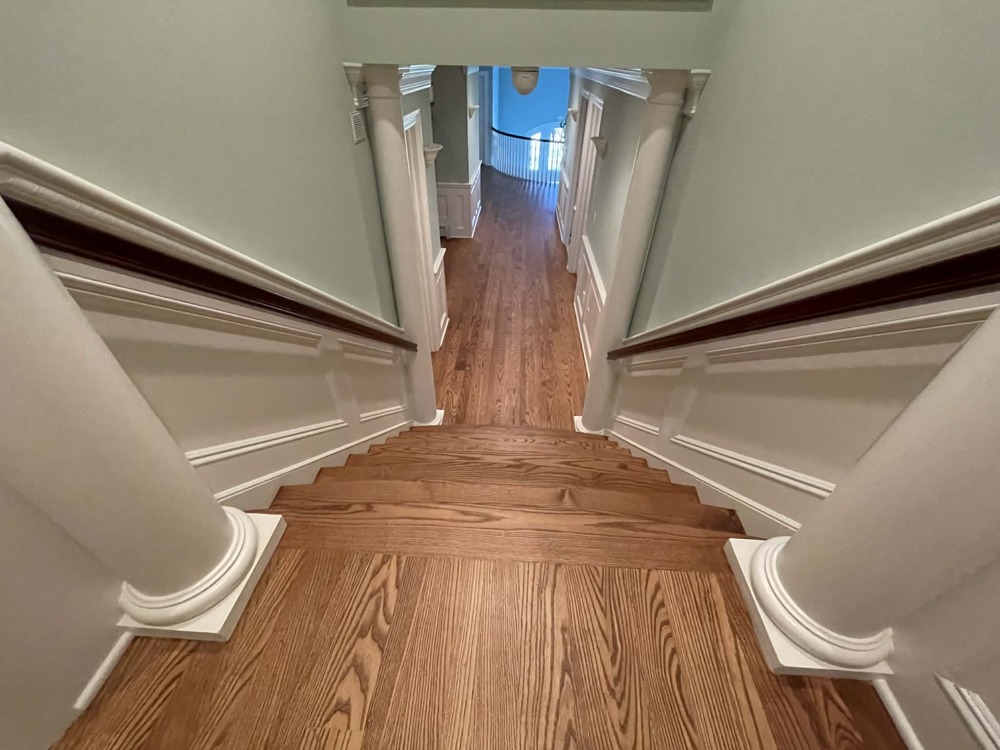 Professional staircase refinishing Brick NJ - Light oak finish