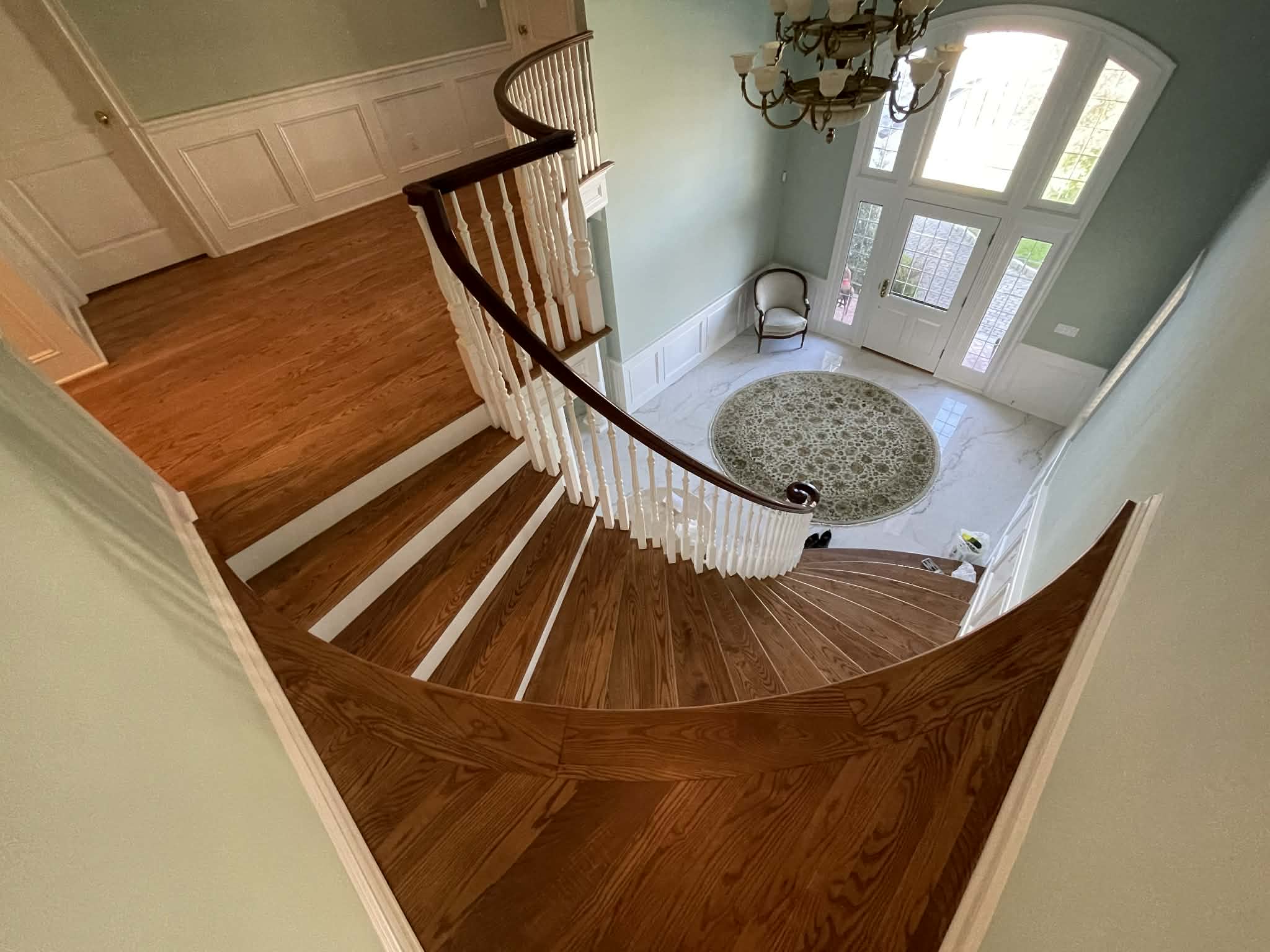 Elegant curved staircase refinishing Toms River NJ